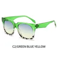 Square fashion sunglasses with transparent green tortoise frame and blue-yellow gradient lens - Green Tortoiseshell Frame / Blue Yellow Lenses