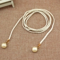 Women's woven waist rope belt in beige with dual large pearl tassels and gold accents - White