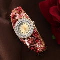 Elegant gold flower bangle watch with colorful rhinestones on vintage silk background - Red/Gold