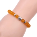 8mm orange agate beaded bracelet with silver Buddha head on a wrist model - Yellow
