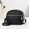 Classic black pebble leather crossbody bag for women with triple zippers and silver hardware - Black