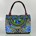 Ethnic style black canvas tote bag with intricate blue floral embroidery and wood beads - Small Blue Peony