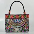 Ethnic style black canvas tote bag with floral embroidery and wooden bead handles - Money Tree