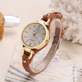 Elegant punk style women's quartz watch with brown rivet leather strap and gold case - Brown