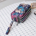 Three-layer canvas wristlet clutch bag with purple floral print and zipper closure - Purple Orchid