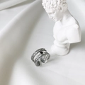 Macro detail of S925 sterling silver vintage ring with black gemstone and floral carvings - Small Round Ring