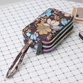 Three-layer floral canvas clutch bag in dark brown with blue and yellow flowers - Wildflower