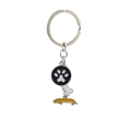 Detail of metal keychain with dog paw, bone, and yellow dachshund enamel charms - Dachshund