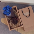 Detailed top view of blue soap roses in a kraft gift box with raffia and carry bag - Premium 7 Pieces / Blue