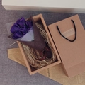 Detailed view of 7 purple soap roses in a rustic kraft gift box with matching carry bag - Premium 7 Pieces / Purple