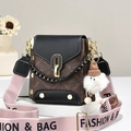 Brown monogram crossbody bag with black leather flap and pink wide strap with plush toy - Black