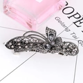 Detailed view of vintage silver butterfly hair clip with grey crystals and rhinestones - Butterfly Hollow - Antique Silver Grey