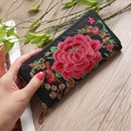 Detail of floral peony embroidery on black fabric long wallet with gold metal zipper - Black