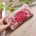 Pink long wallet with floral peony embroidery and heart-shaped metal zipper closure - Pink