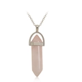 Macro shot of a pink hexagonal quartz crystal point pendant on a silver metal necklace chain - Rose Quartz