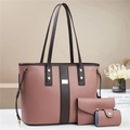 Detailed macro view of the three-piece pink lychee grain leather handbag set with gold hardware - Pink