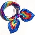 Vibrant rainbow striped satin neck scarf displayed on a minimalist background - 5022 Rainbow Stripes