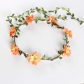 Floral bridal wreath with orange flowers and green leaves for wedding or beach vacations - Orange