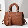 Caramel retro handbag with geometric embossing and small matching envelope pouch - Earthy Yellow