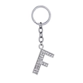 Silver alloy letter F keychain charm with sparkling rhinestones on a round metal ring - Letter F