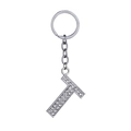 Silver alphabet T keychain with clear rhinestones on a minimalist white background - Letter T