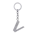 Silver alphabet keychain with letter V featuring sparkling rhinestones and alloy finish - Letter V