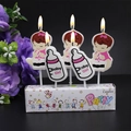Baby Girl themed birthday candle set with pink baby and feeding bottle shapes - Baby Girl Bottle Candle