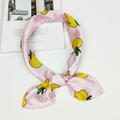 Light pink silk scarf with yellow lemon print and smooth satin finish in knotted style - Pink Apple