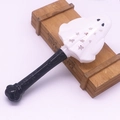 Detailed view of a white ghost head wand for Halloween with black textured handle grip - Ghost Magic Wand