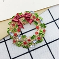 Christmas wreath brooch featuring green enamel leaves and sparkling red rhinestones - 145 Christmas Wreath