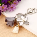 Floral keychain with white enamel flower, grey satin rose, and pearl tassel charm - Grey White Metal Tassel Flower