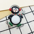 Christmas penguin brooch with black enamel and red earmuffs on a green skateboard - 141 Skating Black Snowman