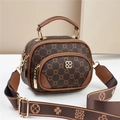 Detailed view of coffee brown crossbody bag with gold zippers and vintage pattern - Coffee