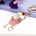 Sparkling pink rhinestone sneaker keychain with delicate heart pendants for handbags - Pink Jelly Sneaker
