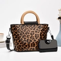 Fashionable leopard print tote bag set with round wooden handles and black crossbody strap - Earthy Yellow