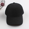 Classic black cotton baseball cap with six-panel design and curved brim in solid black color - Adjustable / Black