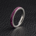 Silver stainless steel eternity ring with rows of vibrant fuchsia pink birthstones - October (Tourmaline)