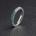 Silver stainless steel eternity ring with light blue crystals on black leather base - December (Turquoise)