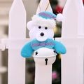 Christmas hanging ornament featuring white plush bear with blue pink hat and star metal bell - White Bell Bear