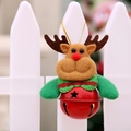 Christmas decoration featuring a brown plush reindeer with a red metal bell and gold lanyard - Red Bell Reindeer