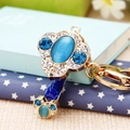 Golden key keychain with blue cat eye stone and crystal pineapple pattern embellishments - Single OPP Bag Packaging / Ruyi Blue