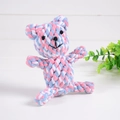 Handmade pink and blue cotton rope bear dog toy for teething and cleaning on wood background - Bear