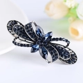 Elegante fermaglio vintage con cristalli blu scuro su una base in lega d'argento - Fiocco 1080