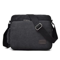 Versatile black canvas messenger bag with large zippered front pocket and adjustable strap - Black