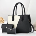 Detailed view of 3-piece tote bag set with black and white contrast leather texture - Black & White