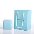 Light blue jewelry gift set featuring a velvet ring box and matching paper carrier bag - Aqua Blue Handbag
