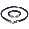 Punk-Set aus schwarzen Obsidianperlen: Armband und Halskette mit Totenkopf-Anhängern - Halskette und Armband Set