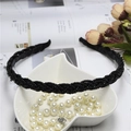 Elegant black beaded braided headband displayed on a white heart-shaped tray - Black (C7132)