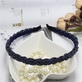 Navy blue beaded braided headband with soft lining shown on a white heart-shaped plate - Navy Blue (C7133)