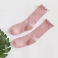 Pink rib-knit crew socks with cute lettuce edge trim displayed on a clean white background - One Size / Dusty Pink